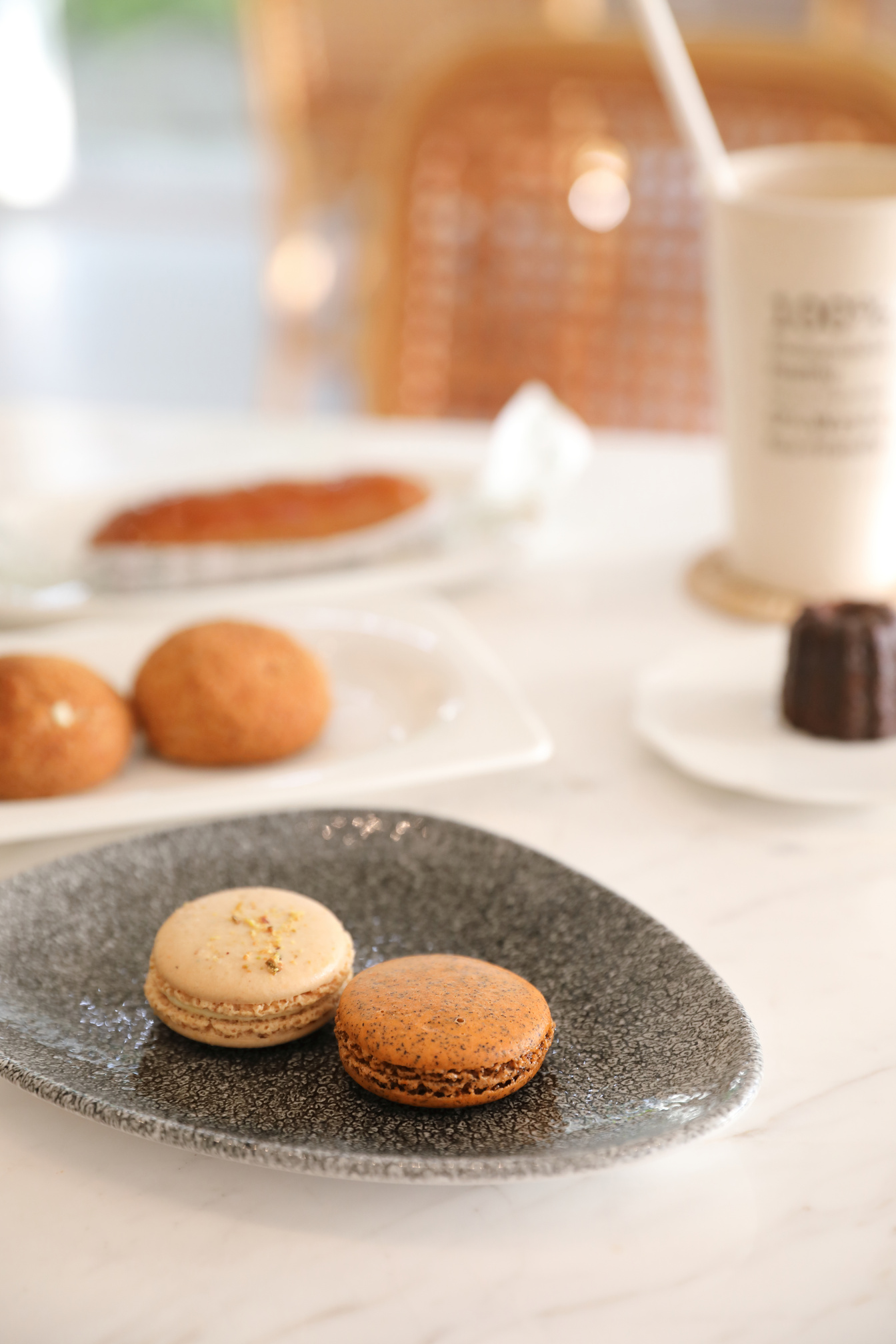 Macarons on Plate at a Cafe